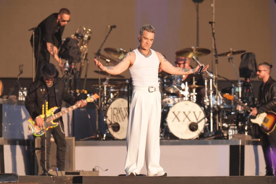 Robbie Williams appears to reignite feud with Oasis after band announce two more gigs amid ticketing chaos