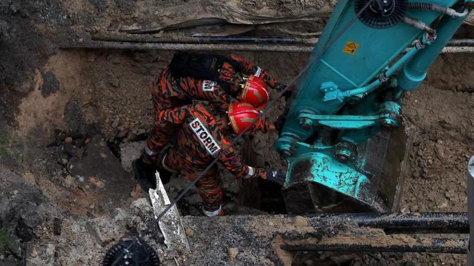 Search for woman swallowed by 8m sinkhole now ‘too risky’