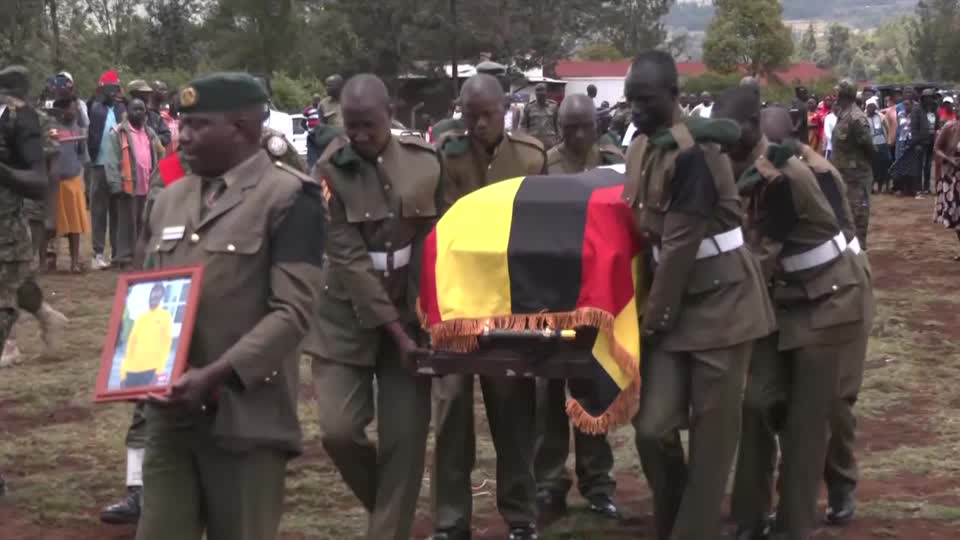 Slain Ugandan Olympian laid to rest with full military honors