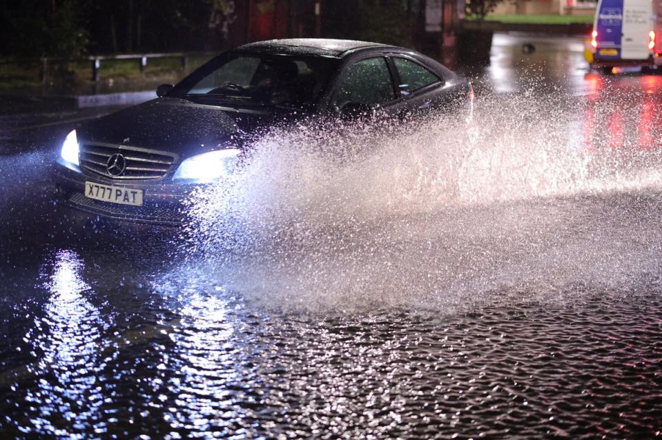 ‘Tornado’ hits Luton as streets flooded and cars submerged outside London