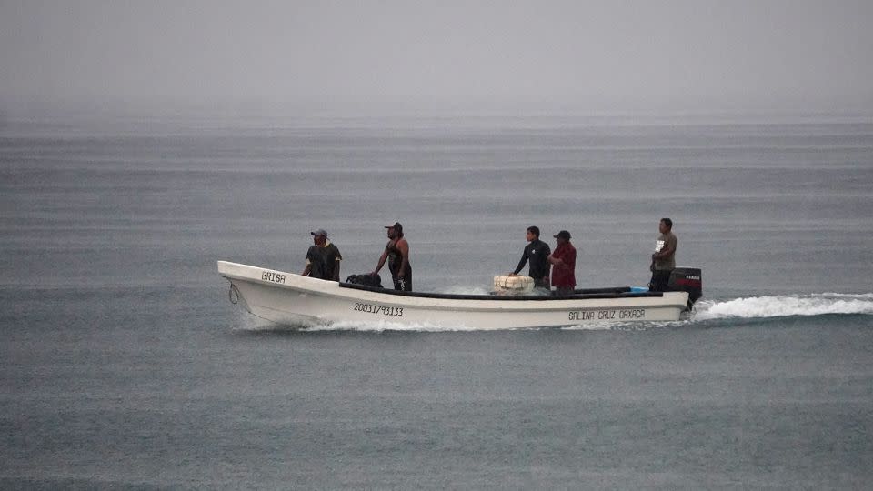 Tropical Storm John triggers warnings of life-threatening floods after slamming into Mexico