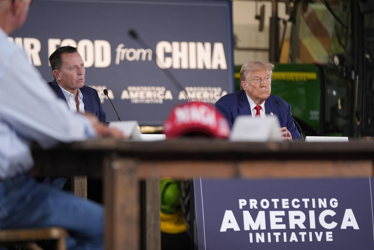 Trump listens during a farming event in rural Pennsylvania, then threatens John Deere with tariffs