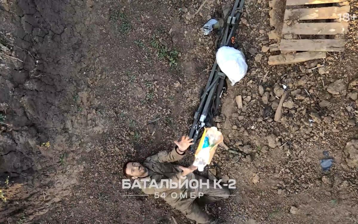 Watch: Ukrainian drone drops bottle of water for dying Russian soldier – and leads him to safety