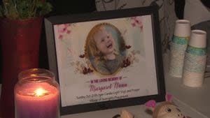 Community holds candlelight vigil in honor of 2-year-old girl who died from ‘serious physical abuse’