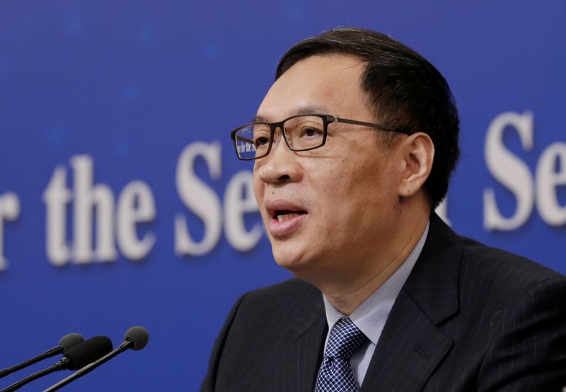 Former China deputy central bank head gets suspended death sentence for taking bribes