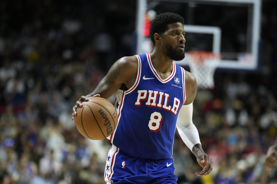 Paul George has bone bruise in hyperextended knee, no structural damage, per 76ers