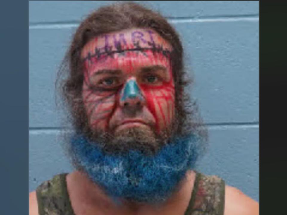 Red, white and arrested too: Patriotic looking man accused of threatening to blow up a makeup store