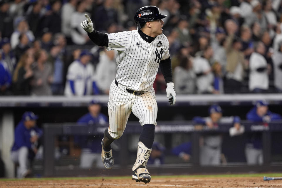 Yankees avoid sweep with a slam-bang World Series Game 4