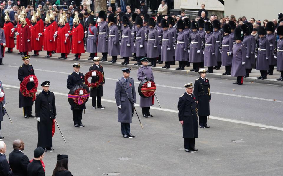 King lays first wreath as Kate and William pay respects in London on Remembrance Sunday