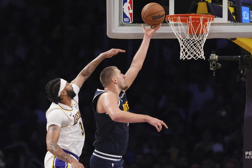 New season, same result: Lakers lose to Nuggets after third-quarter collapse