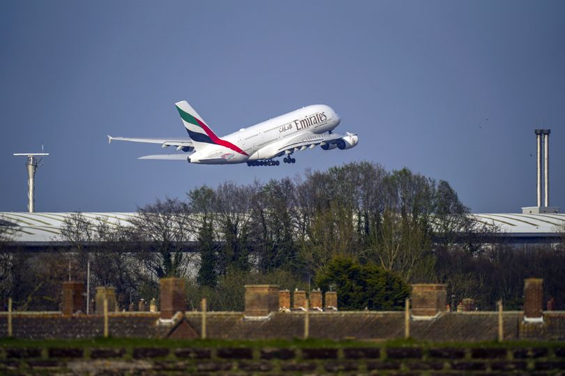 Police board Manchester Airport flight to find man tied up with cable ties