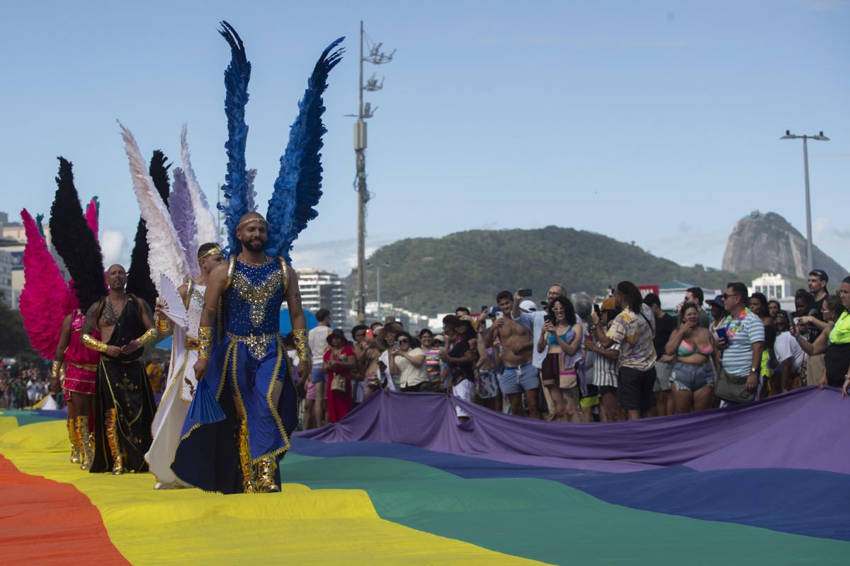 Rainbow-laden revelers hit Copacabana beach for Rio de Janeiro’s pride parade