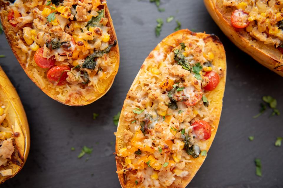 Spaghetti squash stuffed with colorful veggies, chicken makes healthful autumn meal