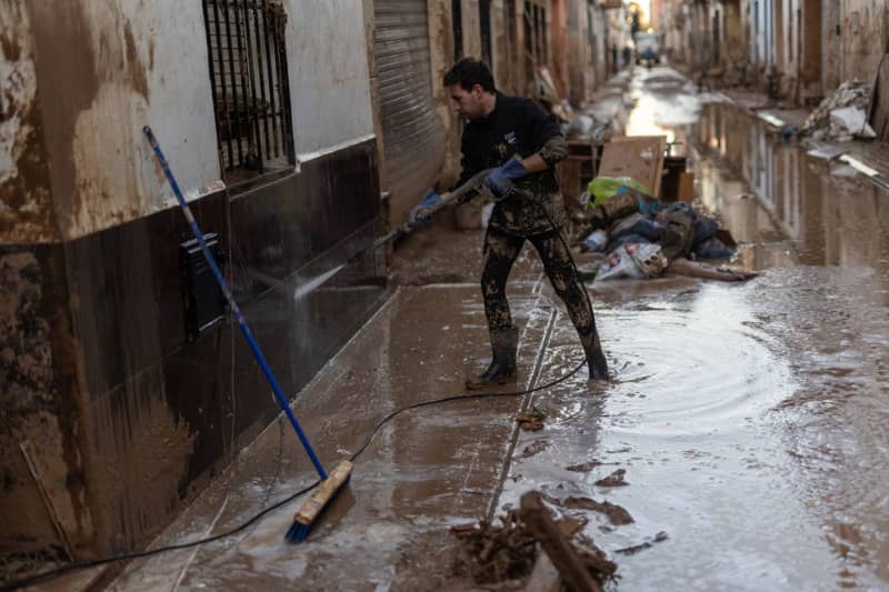 Spain faces more rain as search continues for 23 still missing