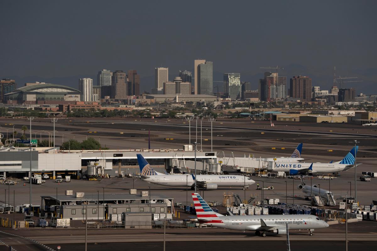 3 shot, 1 stabbed in Christmas night dispute at Phoenix airport, police say