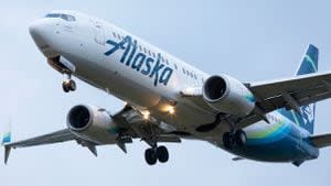 ‘Anxious’ passenger climbs out of emergency exit after an Alaska Airlines gets to the gate