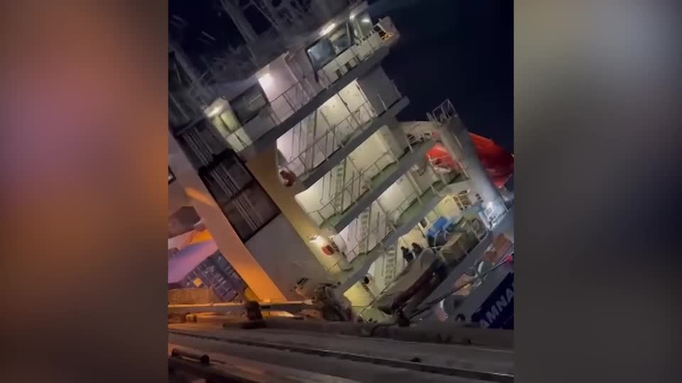 Cargo ship rolls onto its side at an Istanbul port