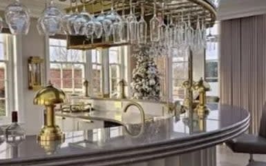 Coleen Rooney reveals lavish art deco bar in £20 Million Mansion after jungle life