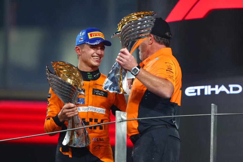 Lando Norris holds his nerve to guide McLaren to F1 glory in Abu Dhabi after 26-year wait