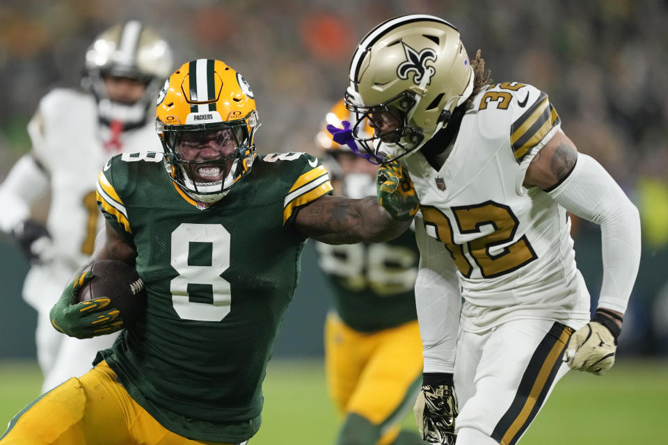 Say cheese! Packers punch playoff ticket by pounding skeleton Saints