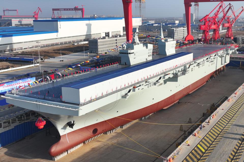 See aboard China’s new massive assault ship that can launch fighter jets or drones