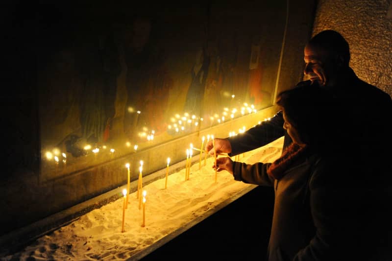 Syrians protest after Christmas tree set on fire