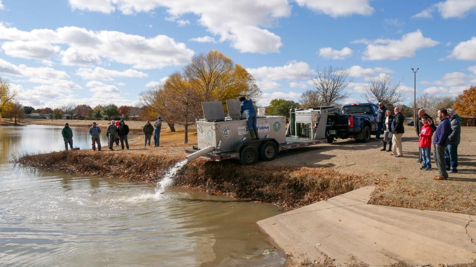 United, Coca-Cola Southwest Beverages team up to stock Lubbock lake with trout