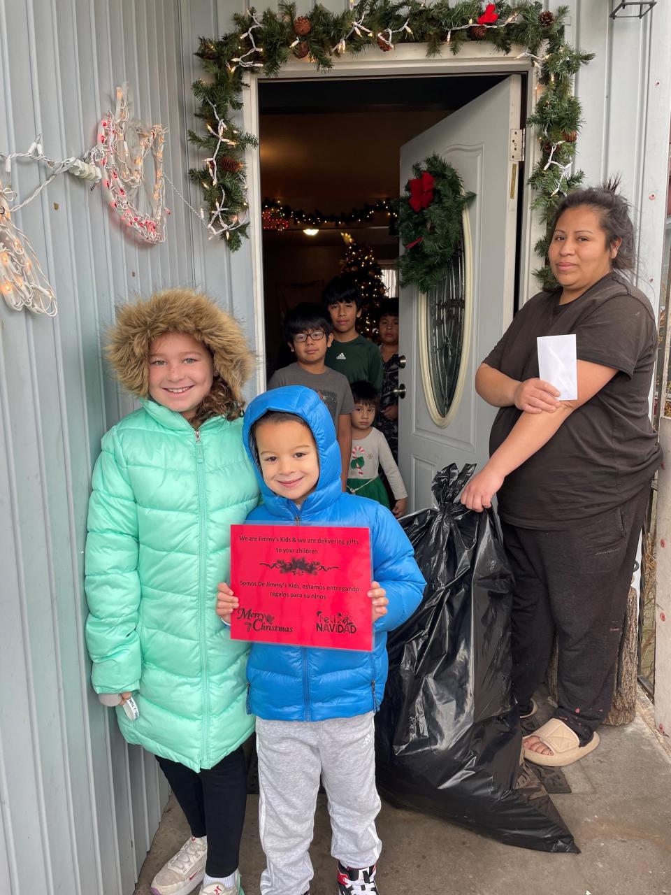 Volunteers of different faiths come together in Detroit to deliver Christmas gifts