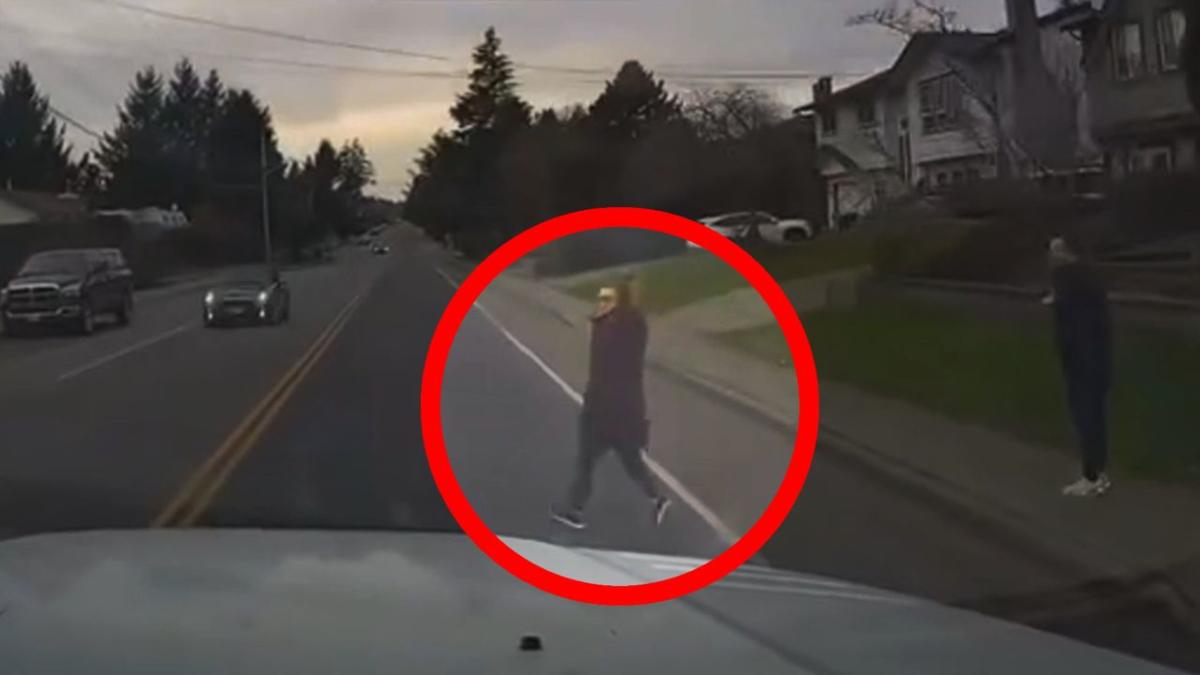 Alert driver avoids crash when woman deliberately walks in front of his truck