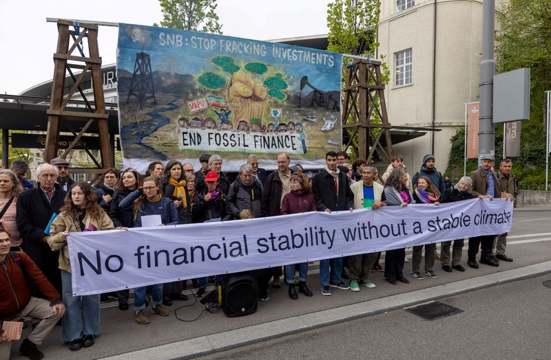 Analysis-Exodus by Wall Street banks from climate group worries advocates