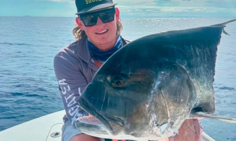 Angler’s cap ‘says it all’ after shark swoops in on epic catch