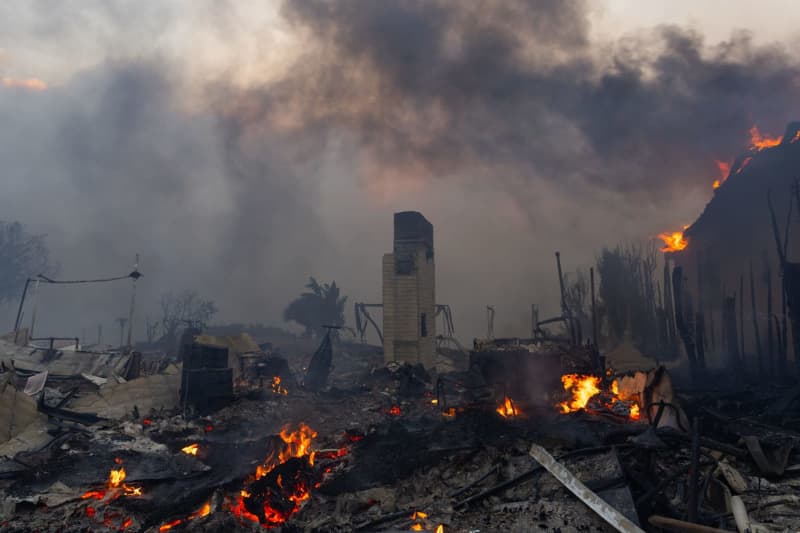 At least five dead as multiple wildfires rage in Los Angeles