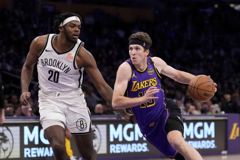 Austin Reaves scores career-high 38 as Lakers edge D’Angelo Russell and Nets