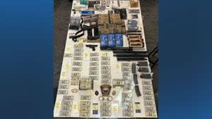 Beverly man with stockpile of guns arrested for inciting shootings at synagogues, police say