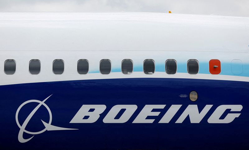 Boeing warns of bigger-than-expected  billion quarterly loss; shares drop