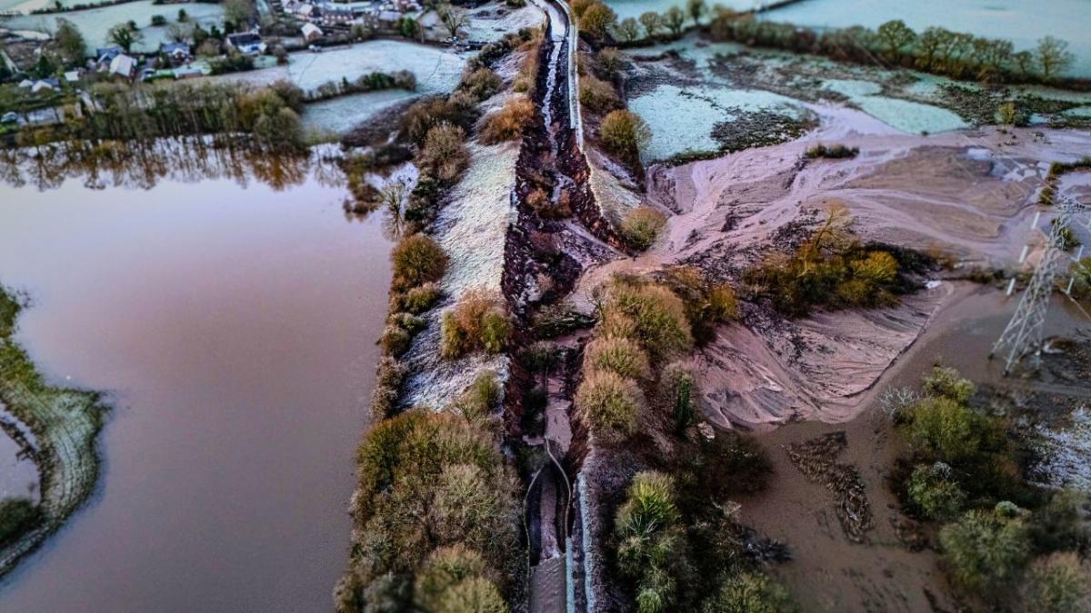 Canal burst after torrential rain devastating landscape