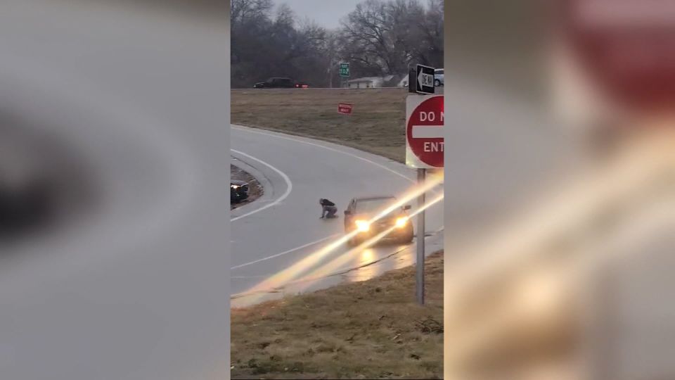 Driver jumps from car sliding on ice