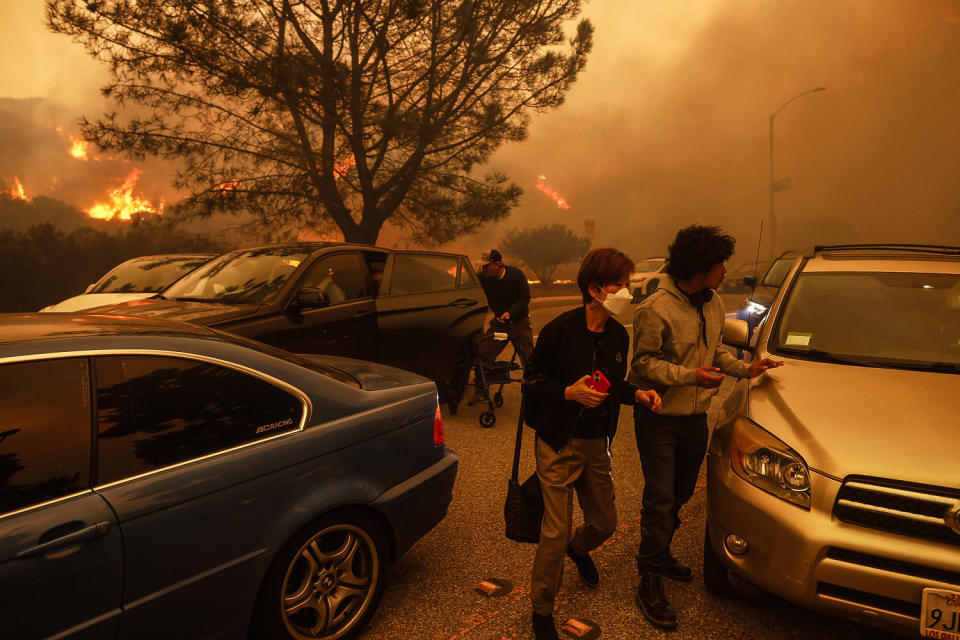 Four fires grow, forcing more than 80,000 evacuations around L.A.