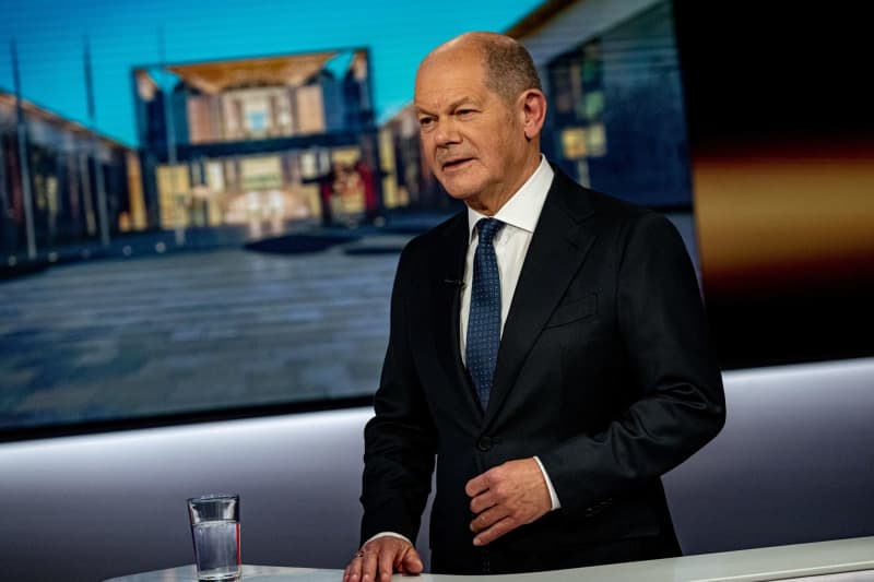 Germany’s Scholz under fire over funding for Ukraine aid package