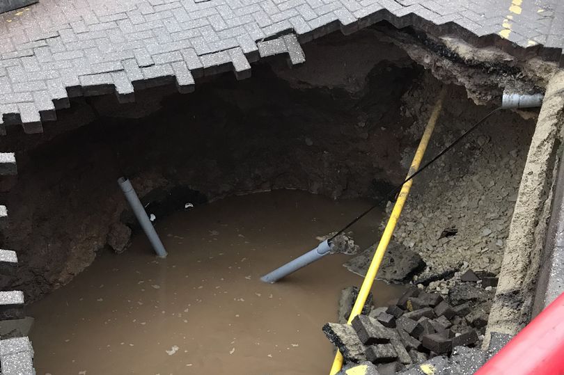 “I heard a bang…and woke up to this”: Huge sinkhole appears on Hyde street