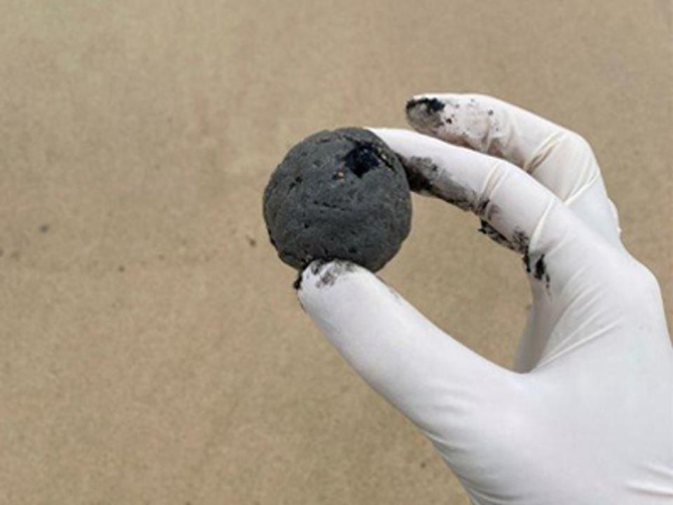 Mysterious marble-sized balls washing up on Sydney beaches baffle authorities