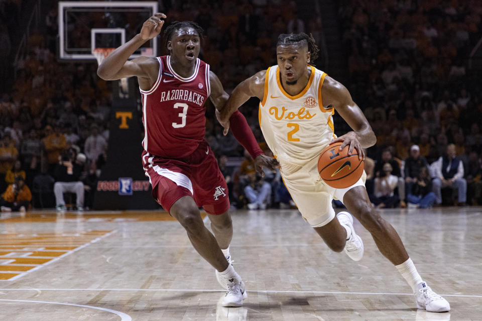 No. 1 Tennessee ties school-record 14-0 start with 76-52 win over Arkansas