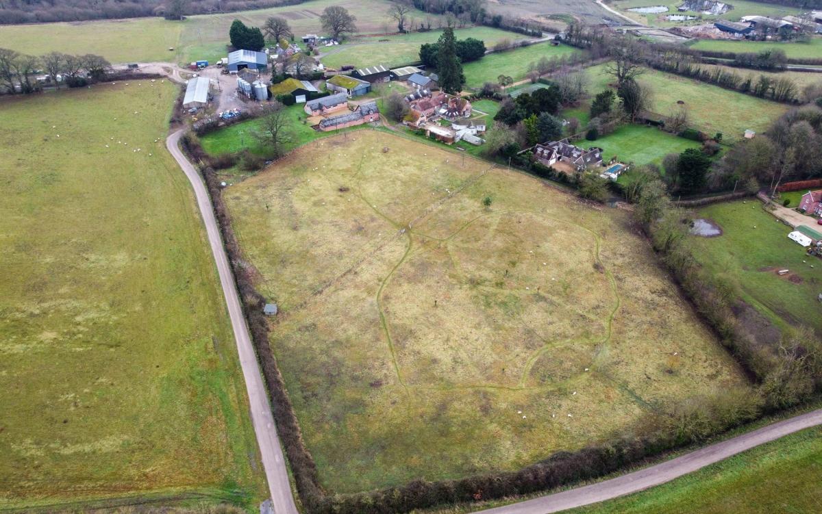 Pensioner wins seven-year battle to block solar farm next to village home