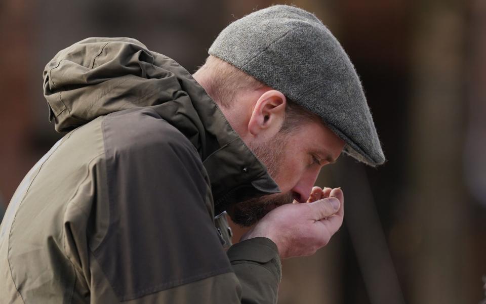 Prince of Wales gets his hands dirty by plunging them into worm-filled compost