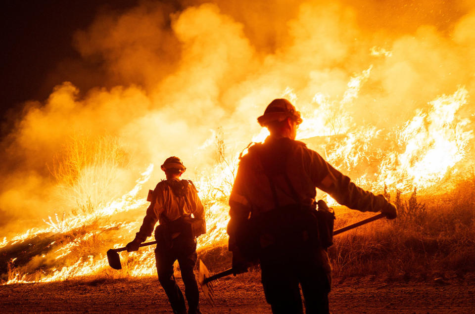 Thousands ordered to flee their homes after new blaze ignites in Los Angeles County