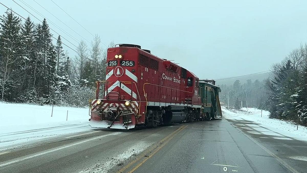 Train appears in front of driver on road in New Hampshire