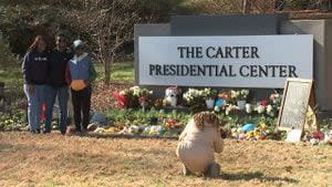 Travelers still showing up at Carter Center despite being closed for funeral preparations