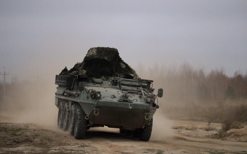 Ukrainian paratroopers try to crush Russian soldiers with armoured vehicle