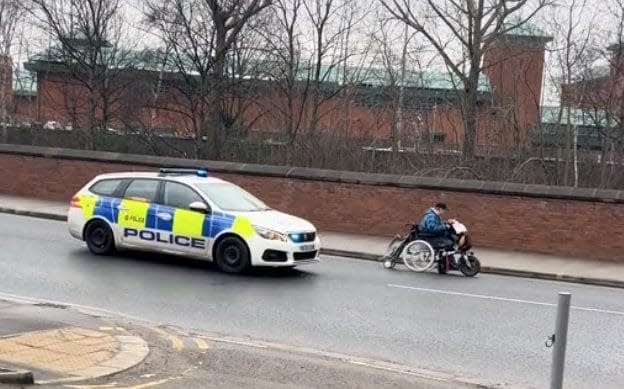 Woman in wheelchair evades police in blue light car chase