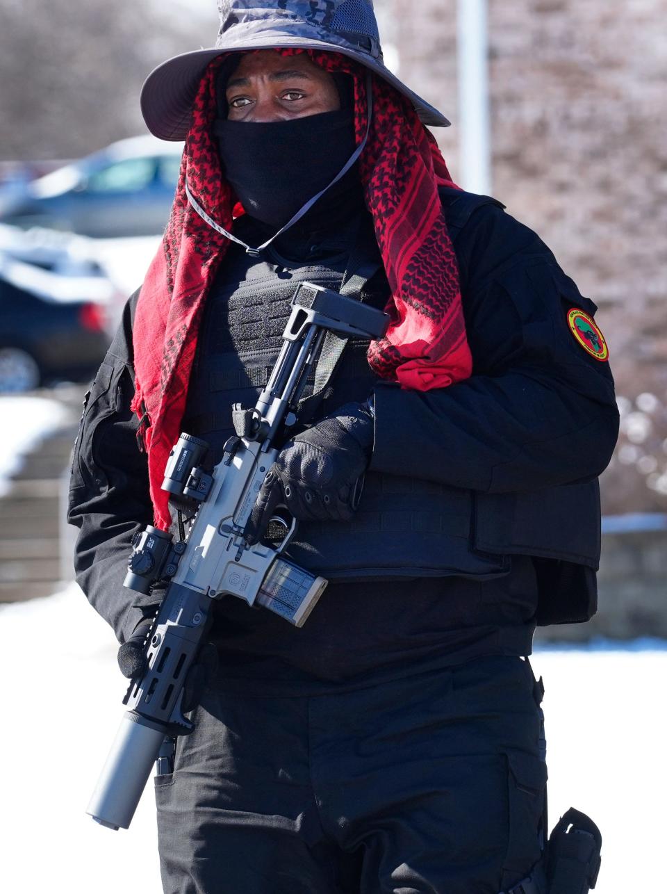 Armed men are guarding the streets of Lincoln Heights, stopping cars and vetting passersby